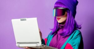 80s style woman holding laptop
